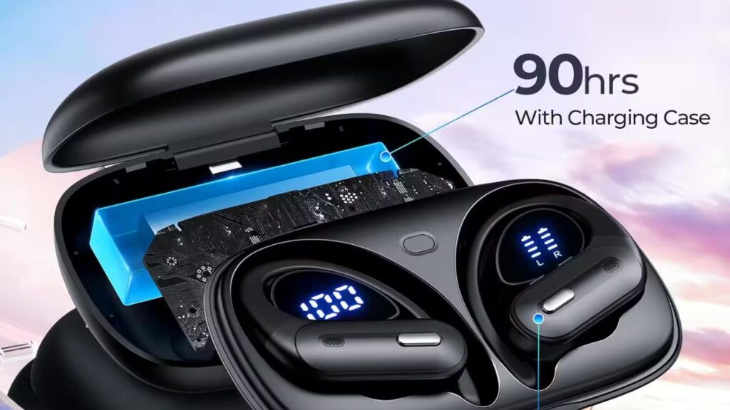 Wireless earbuds charging inside a USB-C charging case placed on a wireless charging pad.
